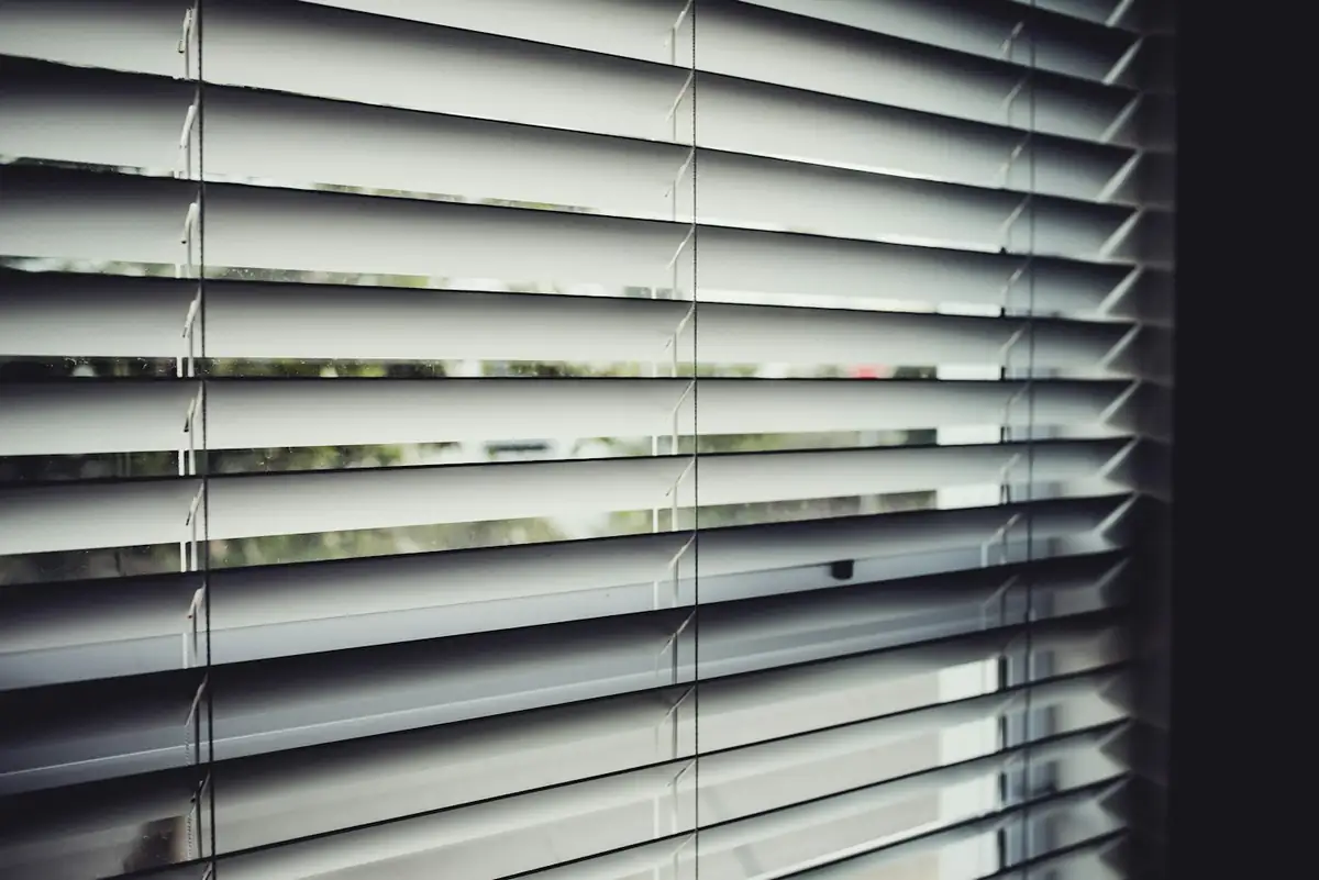 white-window-blinds-close-up.webp